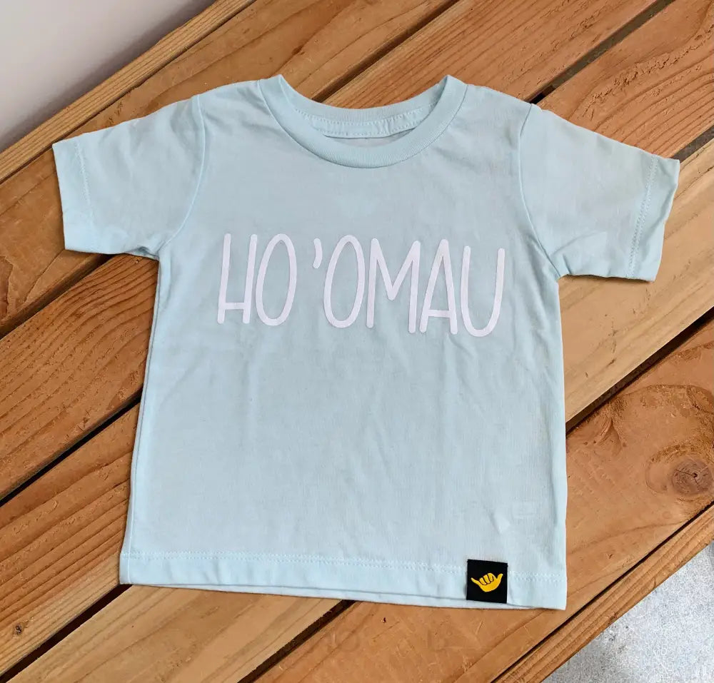 HOLOHOLO MAMA - Hoʻomau Keiki Baby Blue T-Shirt - Noʻeau Designers